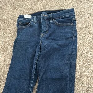 Dark wash blue jeans